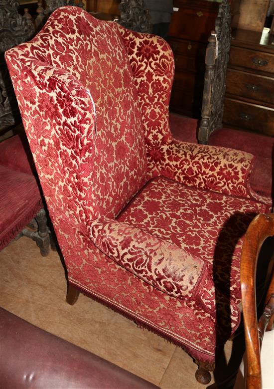 Upholstered wing armchair